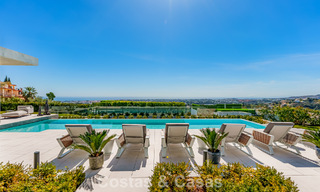 High-end luxury villa with panoramic sea views for sale in a prestigious resort, Benahavis - Marbella 788410 