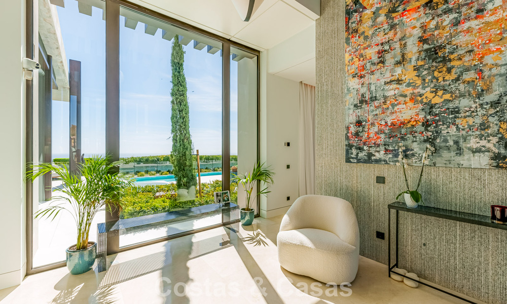 High-end luxury villa with panoramic sea views for sale in a prestigious resort, Benahavis - Marbella 788417