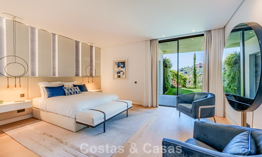 High-end luxury villa with panoramic sea views for sale in a prestigious resort, Benahavis - Marbella 788421