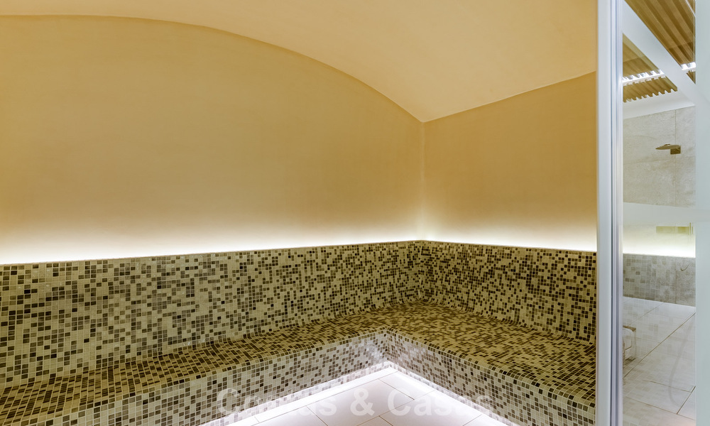 High-end luxury villa with panoramic sea views for sale in a prestigious resort, Benahavis - Marbella 788427