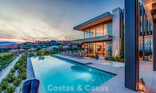 High-end luxury villa with panoramic sea views for sale in a prestigious resort, Benahavis - Marbella 788434 