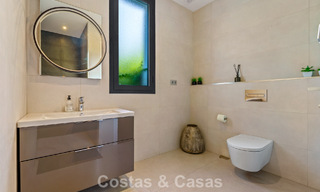 Exclusive villa with sea views for sale in a secure urbanization in La Quinta, Marbella - Benahavis 788559 