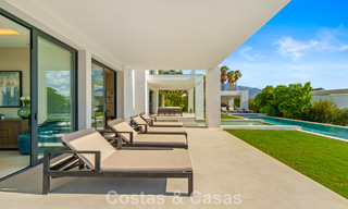 Exclusive villa with sea views for sale in a secure urbanization in La Quinta, Marbella - Benahavis 788564 