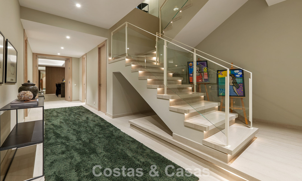 Minimalist luxury home with panoramic sea views for sale in a prestigious gated complex in Nueva Andalucia, Marbella 788594