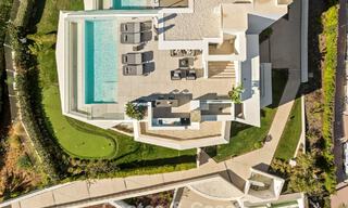 Minimalist luxury home with panoramic sea views for sale in a prestigious gated complex in Nueva Andalucia, Marbella 788603 