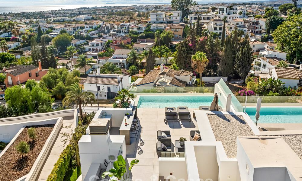 Minimalist luxury home with panoramic sea views for sale in a prestigious gated complex in Nueva Andalucia, Marbella 788606