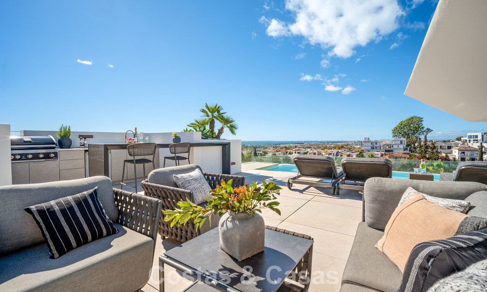 Minimalist luxury home with panoramic sea views for sale in a prestigious gated complex in Nueva Andalucia, Marbella 788607