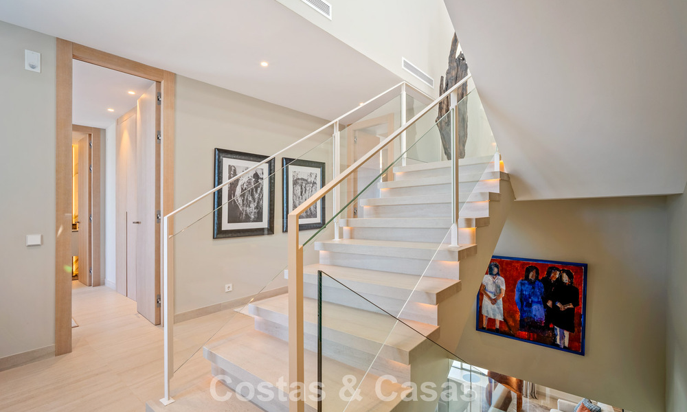 Minimalist luxury home with panoramic sea views for sale in a prestigious gated complex in Nueva Andalucia, Marbella 788610