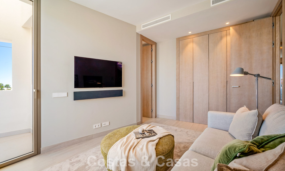 Minimalist luxury home with panoramic sea views for sale in a prestigious gated complex in Nueva Andalucia, Marbella 788616