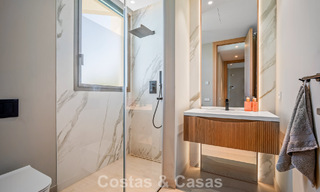 Minimalist luxury home with panoramic sea views for sale in a prestigious gated complex in Nueva Andalucia, Marbella 788626 