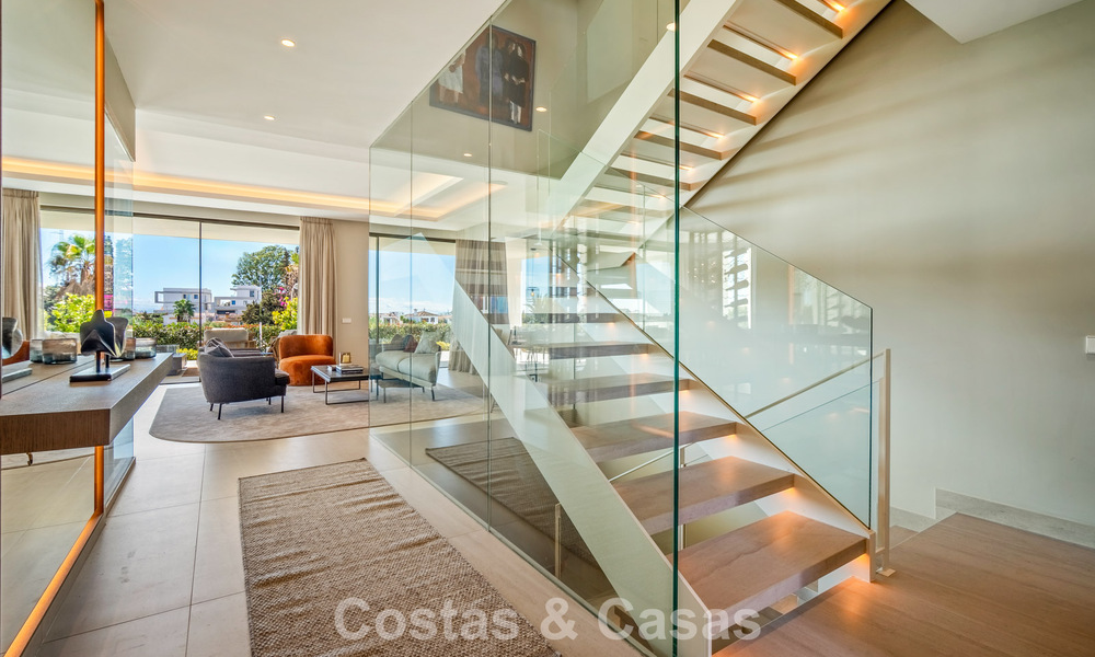 Minimalist luxury home with panoramic sea views for sale in a prestigious gated complex in Nueva Andalucia, Marbella 788627