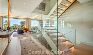 Minimalist luxury home with panoramic sea views for sale in a prestigious gated complex in Nueva Andalucia, Marbella 788627 
