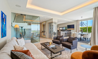 Minimalist luxury home with panoramic sea views for sale in a prestigious gated complex in Nueva Andalucia, Marbella 788628 