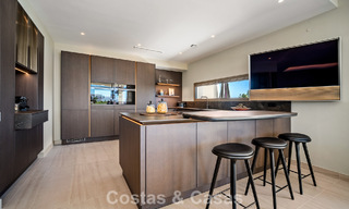 Minimalist luxury home with panoramic sea views for sale in a prestigious gated complex in Nueva Andalucia, Marbella 788632 