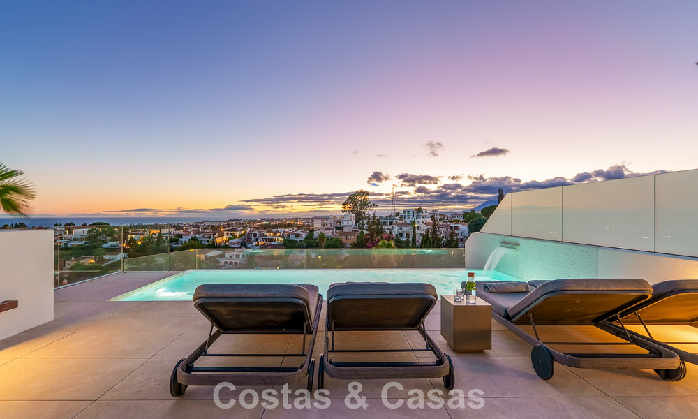 Minimalist luxury home with panoramic sea views for sale in a prestigious gated complex in Nueva Andalucia, Marbella 788653