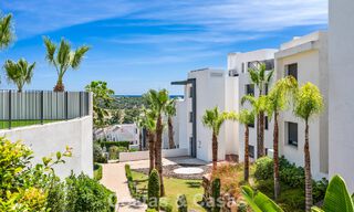 Ground-floor, modern apartment with large private garden, terrace and partial sea views for sale on golf course in Estepona 789776 