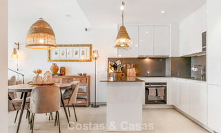 Ground-floor, modern apartment with large private garden, terrace and partial sea views for sale on golf course in Estepona 789777 