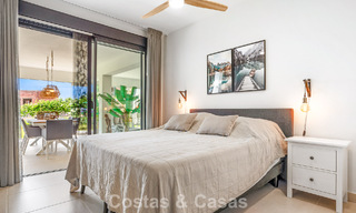 Ground-floor, modern apartment with large private garden, terrace and partial sea views for sale on golf course in Estepona 789785 