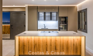 Luxurious renovated penthouse with mountain and sea views for sale in a gated complex in Nueva Andalucia, Marbella 789757 