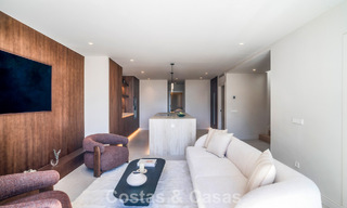Andalusian-style duplex penthouse with a contemporary interior for sale in Nueva Andalucia, Marbella 789817 