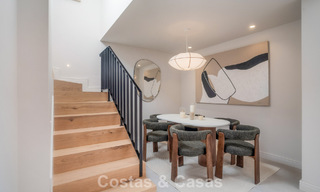 Andalusian-style duplex penthouse with a contemporary interior for sale in Nueva Andalucia, Marbella 789821 