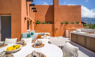 Andalusian-style duplex penthouse with a contemporary interior for sale in Nueva Andalucia, Marbella 789823 