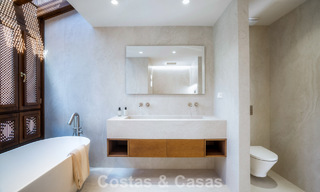 Andalusian-style duplex penthouse with a contemporary interior for sale in Nueva Andalucia, Marbella 789830 