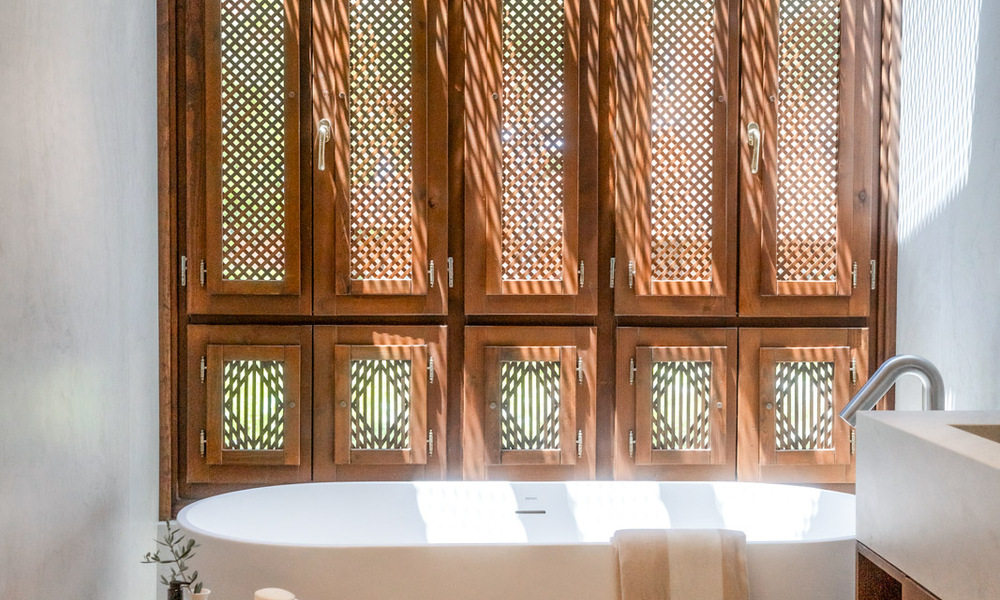 Andalusian-style duplex penthouse with a contemporary interior for sale in Nueva Andalucia, Marbella 789831