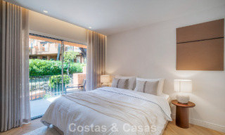Andalusian-style duplex penthouse with a contemporary interior for sale in Nueva Andalucia, Marbella 789833 