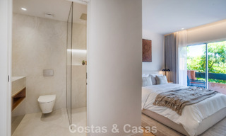 Andalusian-style duplex penthouse with a contemporary interior for sale in Nueva Andalucia, Marbella 789836 