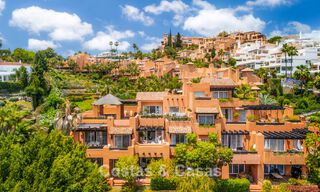 Andalusian-style duplex penthouse with a contemporary interior for sale in Nueva Andalucia, Marbella 789837 
