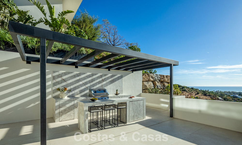 Attractive designer villa with spectacular sea views for sale in Elviria, east of Marbella center 789116