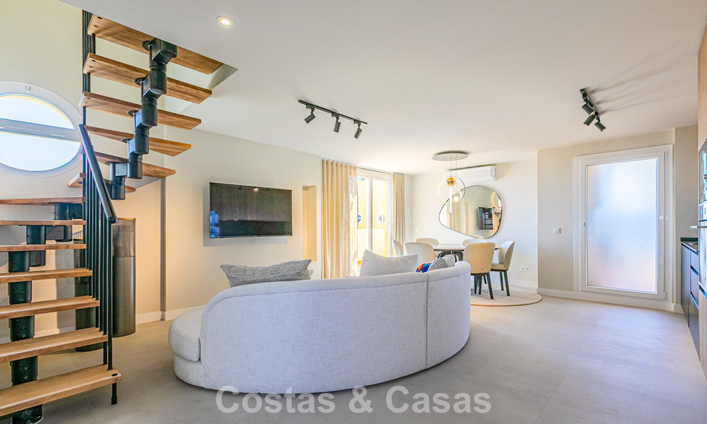 Duplex penthouse with sea views for sale within walking distance of amenities and Puerto Banus in Nueva Andalucia, Marbella 789308