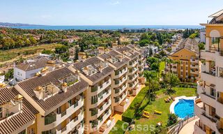 Duplex penthouse with sea views for sale within walking distance of amenities and Puerto Banus in Nueva Andalucia, Marbella 789317 