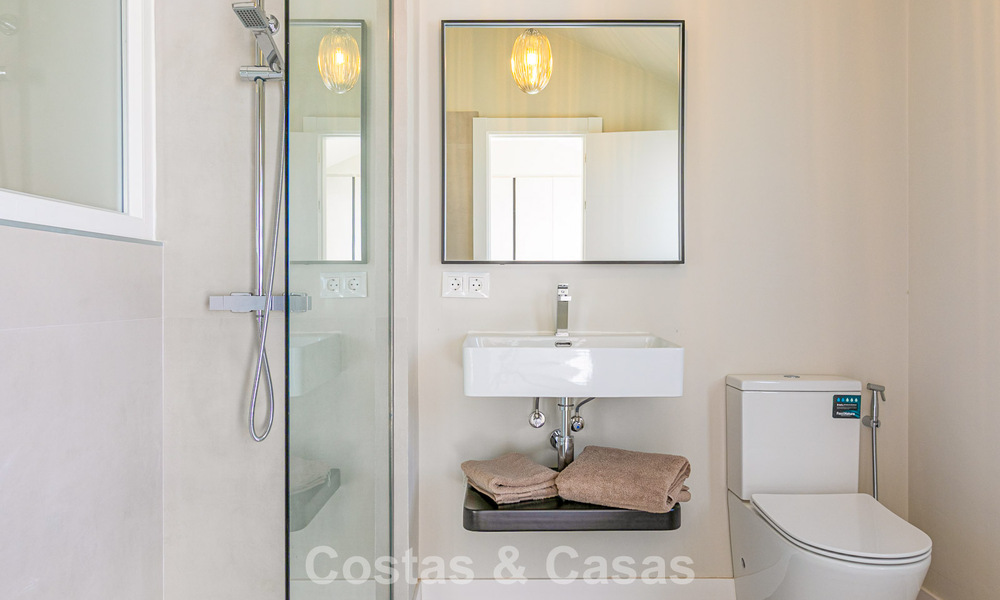 Duplex penthouse with sea views for sale within walking distance of amenities and Puerto Banus in Nueva Andalucia, Marbella 789331