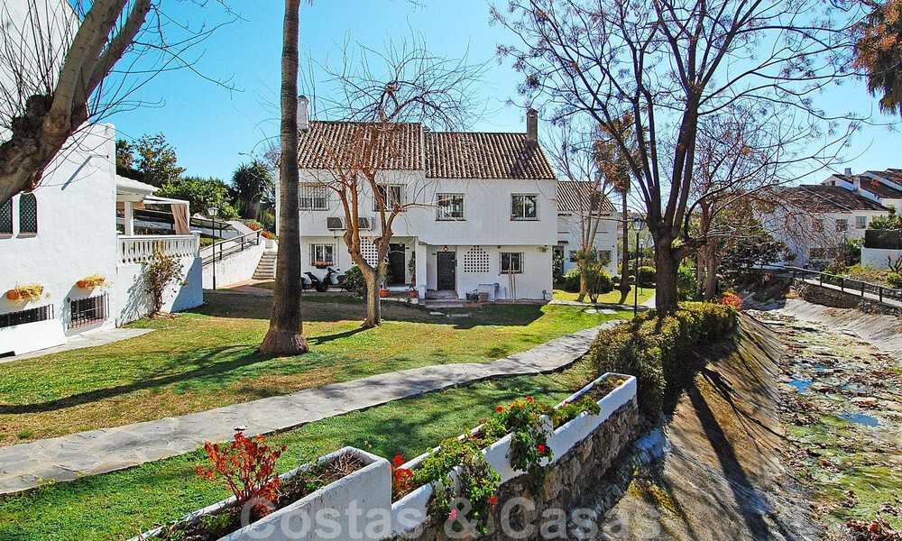 Charming townhouses for sale in a gated community on Marbella’s Golden Mile 808421