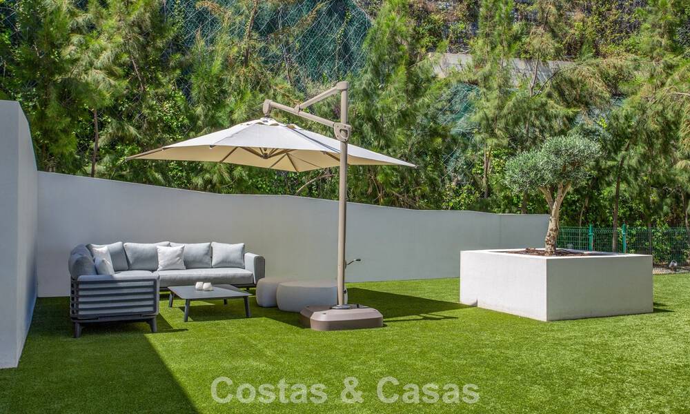 Stylish 3-bedroom apartment for sale with panoramic sea views in a gated resort in Benahavis - Marbella 790142