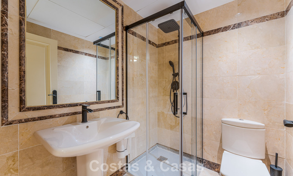 Modern renovated apartment for sale in a magnificent Sierra Blanca complex on the Golden Mile in Marbella 790294