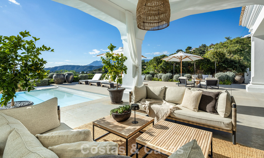 Mediterranean luxury villa with classic architecture for sale and sea views in Marbella Club Resort in Benahavís 790368