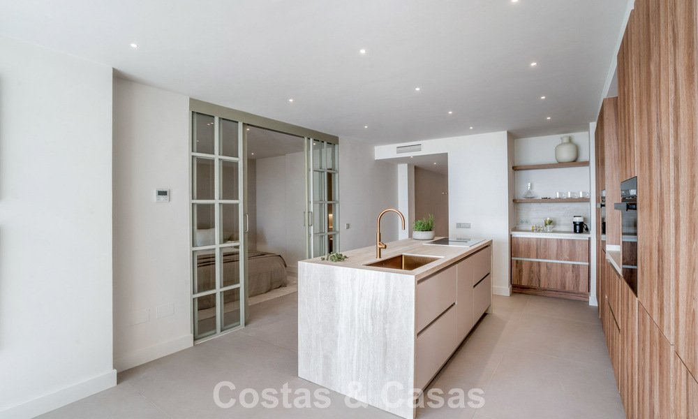 Contemporary renovated 3-bedroom apartment for sale with private pool and sea views in Nueva Andalucia, Marbella 790797