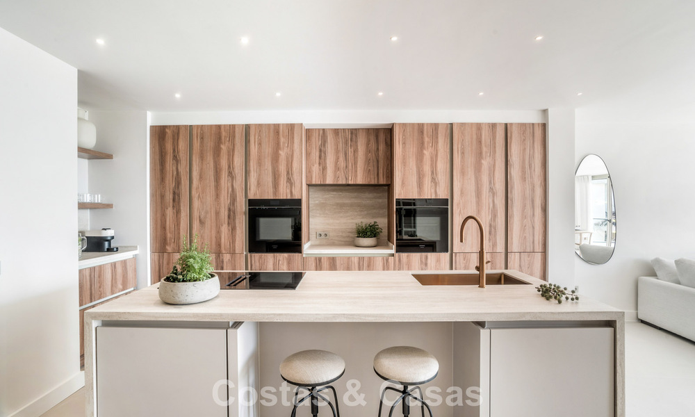 Contemporary renovated 3-bedroom apartment for sale with private pool and sea views in Nueva Andalucia, Marbella 790811