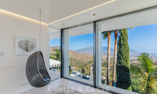 Contemporary luxury villa with panoramic mountain and sea views for sale in the hills of East Marbella 790991 