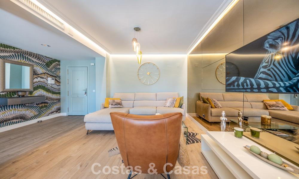 Contemporary renovated apartment for sale in Nueva Andalucía, within walking distance of the beach and Puerto Banús, Marbella 790902