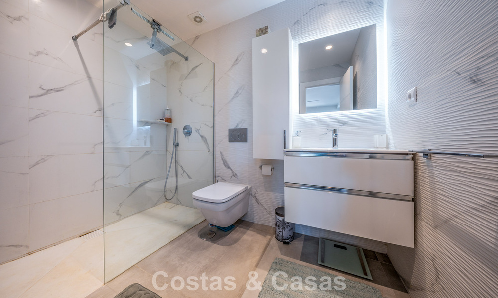 Contemporary renovated apartment for sale in Nueva Andalucía, within walking distance of the beach and Puerto Banús, Marbella 790910