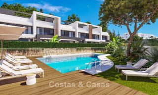 Contemporary townhouses with modern design for sale in a golf setting in Mijas Costa, Costa del Sol 791820 