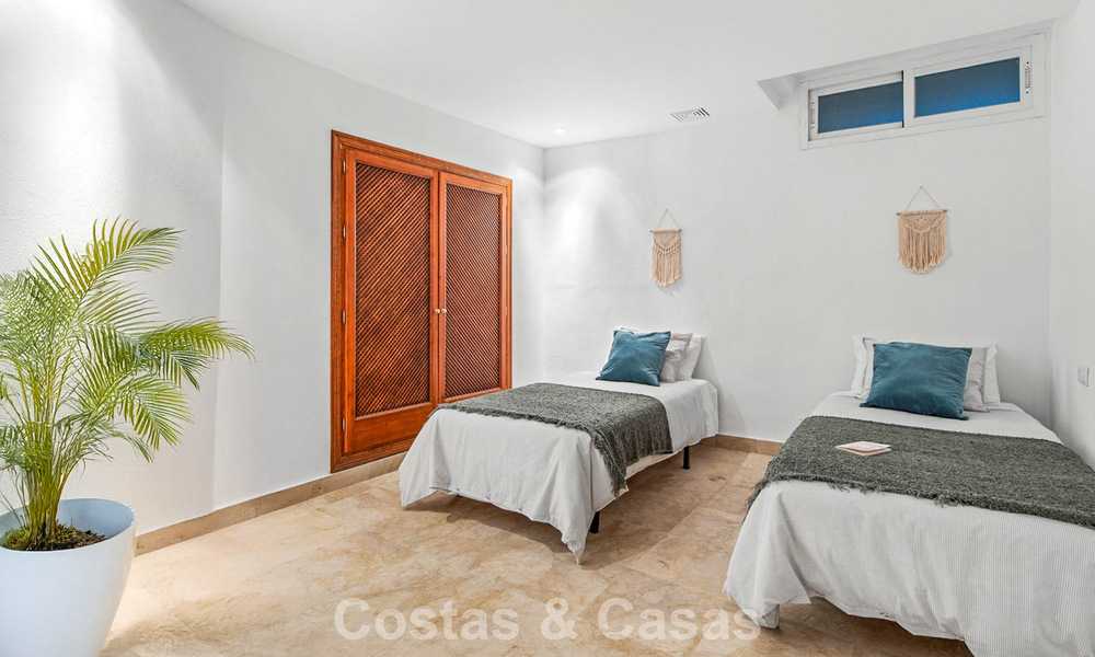 Very spacious garden apartment for sale in a beachfront complex on the New Golden Mile between Marbella and Estepona 792128