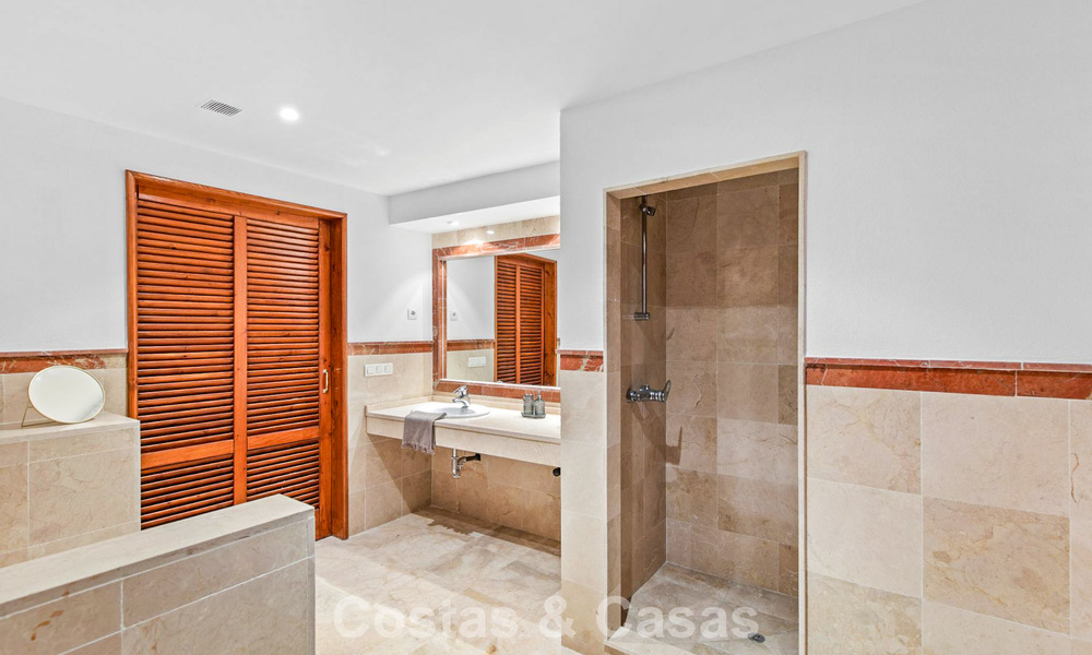 Very spacious garden apartment for sale in a beachfront complex on the New Golden Mile between Marbella and Estepona 792130