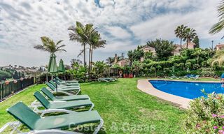 Elegant 4-bedroom corner townhouse for sale in a gated and secure community in Nueva Andalucía, Marbella 792229 