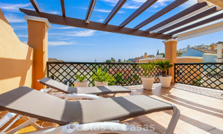 Elegant 4-bedroom corner townhouse for sale in a gated and secure community in Nueva Andalucía, Marbella 792254 