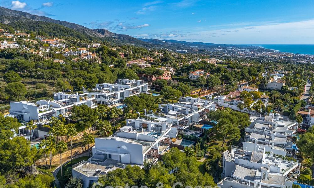 Modern semi-detached villa for sale with sublime sea views in a gated community in Sierra Blanca, Marbella’s Golden Mile 793040